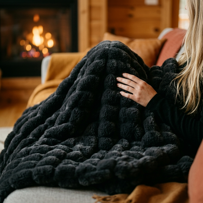 Nova Plush Faux Fur Throw in Black, cozy cabin